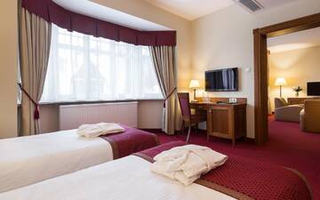 Фото номера Апартаменты с балконом и видом на парк Отель Bukowy Park Hotel Medical SPA г. Поляница-Здруй 5